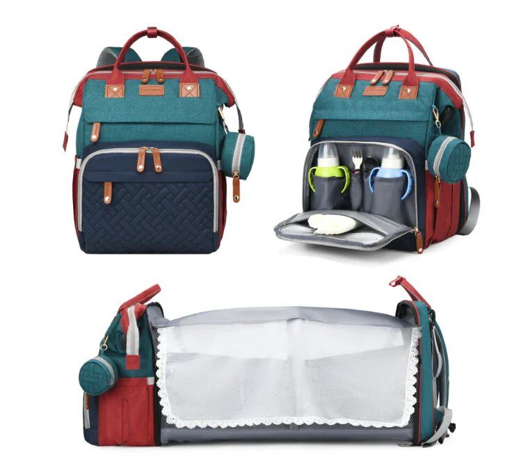 Savirro Babyreise-Rucksack in Petrol / Rot, gefaltet und als Babybett